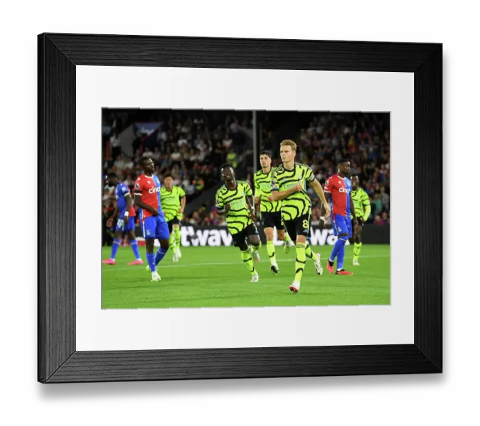Framed Print : Martin Odegaard Scores First Goal: Arsenal Triumphs Over Crystal Palace in 2023-24 Premier League Clash
