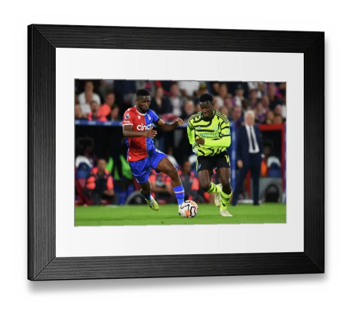 Framed Print : Arsenal's Nketiah Faces Pressure from Crystal Palace's Lerma in Premier League Clash