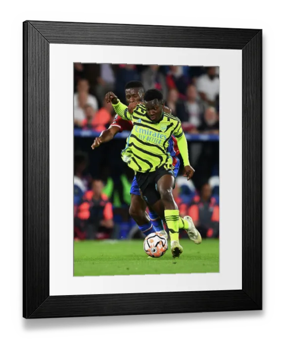 Framed Print : Arsenal's Nketiah Faces Off Against Crystal Palace's Lerma in Premier League Clash Framed Print : Arsenal's Nketiah Faces Off Against Crystal Palace's Lerma in Premier League Clash