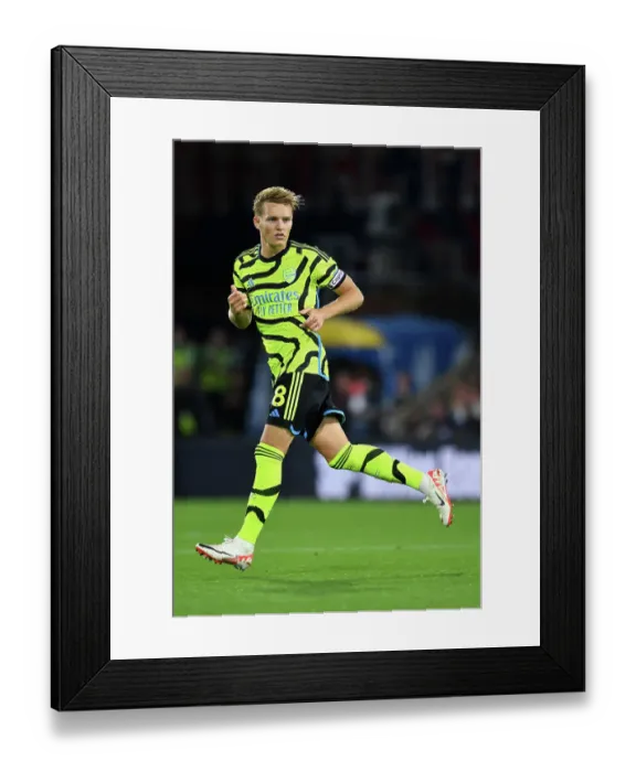 Framed Print : Martin Odegaard Ponders Next Move at Selhurst Park: Crystal Palace vs. Arsenal, Premier League 2023-24