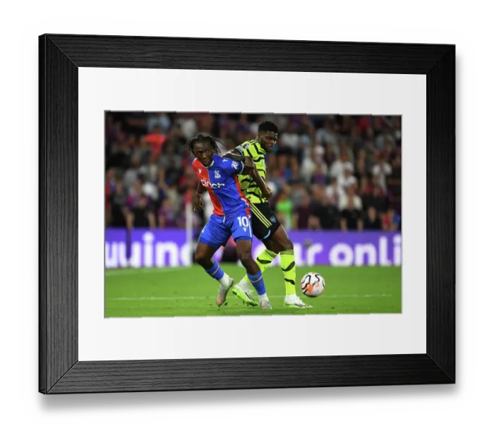 Framed Print : Battle for Possession: Thomas Partey vs. Eberechi Eze in Crystal Palace vs. Arsenal FC (2023-24)