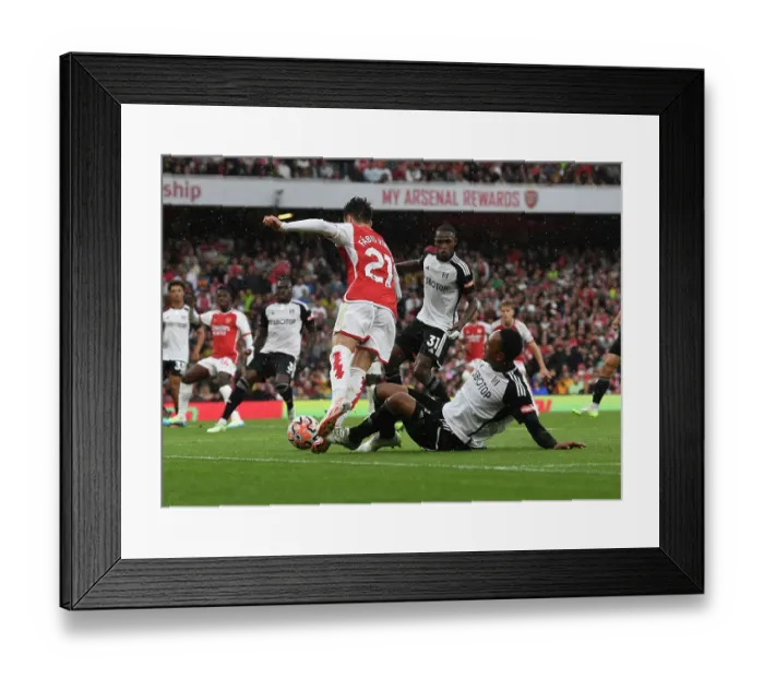 Framed Print : Arsenal's Penalty Victory: Fulham's Tete Trips Fabio Vieira Framed Print : Arsenal's Penalty Victory: Fulham's Tete Trips Fabio Vieira