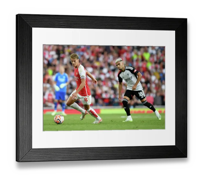 Framed Print : Arsenal's Odegaard Shines in Premier League Clash Against Fulham