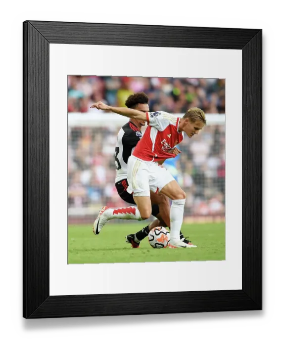 Framed Print : Arsenal vs. Fulham: Battle for Possession in the Premier League (2023-24)