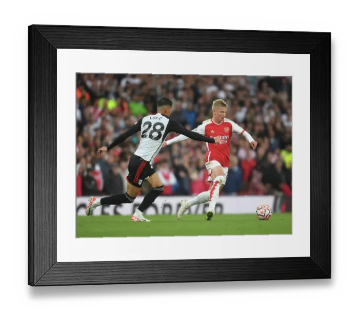 Framed Print : Arsenal's Zinchenko Outmaneuvers Fulham's Lukic in 2023-24 Premier League Clash