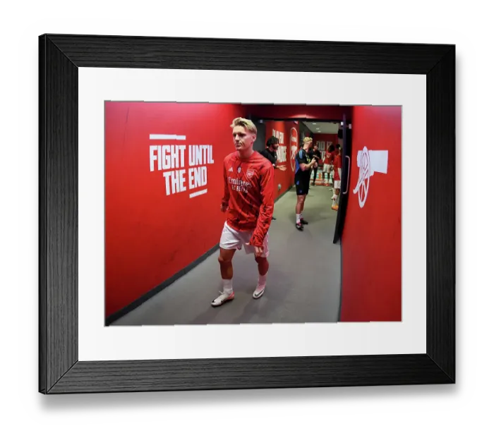 Framed Print : Arsenal's Odegaard Prepares for Battle: Arsenal FC vs Fulham FC, Premier League 2023-24