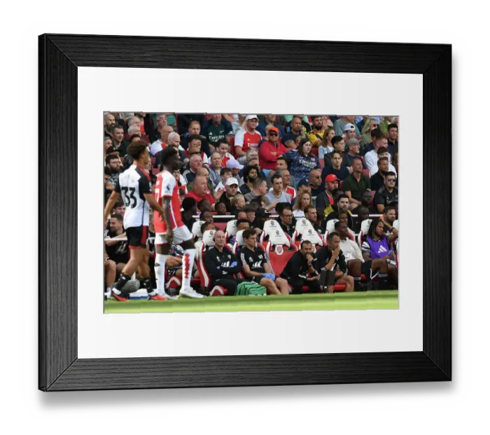 Framed Print : Arsenal vs Fulham: Intense Moment as Fulham Physio Attends to Injured Player (2023-24 Premier League)