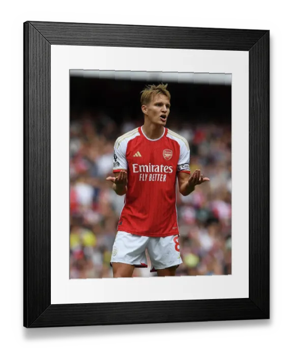 Framed Print : Arsenal's Martin Odegaard Shines in Premier League Clash Against Fulham (2023-24)