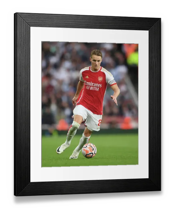 Framed Print : Arsenal's Martin Odegaard Shines in Arsenal FC vs Fulham FC Premier League Clash (2023-24)