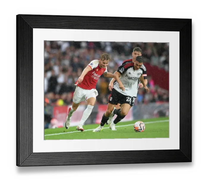 Framed Print : Arsenal's Martin Odegaard Clashes with Fulham's Joao Palhinha in Premier League Showdown at Emirates Stadium (2023-24) Framed Print : Arsenal's Martin Odegaard Clashes with Fulham's Joao Palhinha in Premier League Showdown at Emirates Stadium (2023-24)