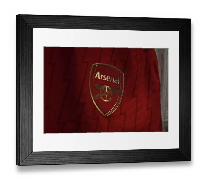 Framed Print : Detailed Look: Arsenal Crest Before Arsenal vs Manchester United (2023-24)
