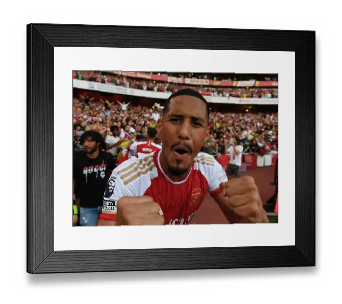 Framed Print : Arsenal Celebrate: Declan Rice's Double Strike Against Manchester United (2023-24) Framed Print : Arsenal Celebrate: Declan Rice's Double Strike Against Manchester United (2023-24)