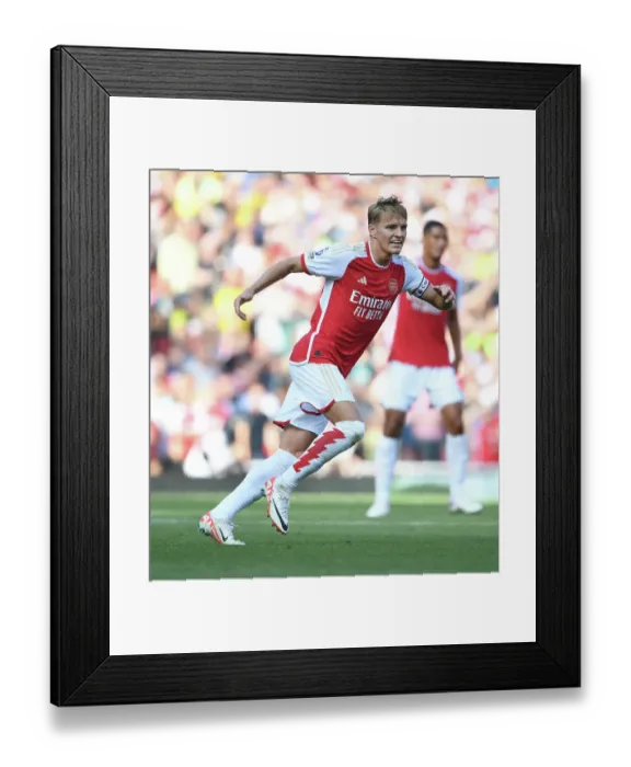 Framed Print : Martin Odegaard's Brilliant Performance: Arsenal's Thrilling Victory Over Manchester United in the 2023-24 Premier League Framed Print : Martin Odegaard's Brilliant Performance: Arsenal's Thrilling Victory Over Manchester United in the 2023-24 Premier League