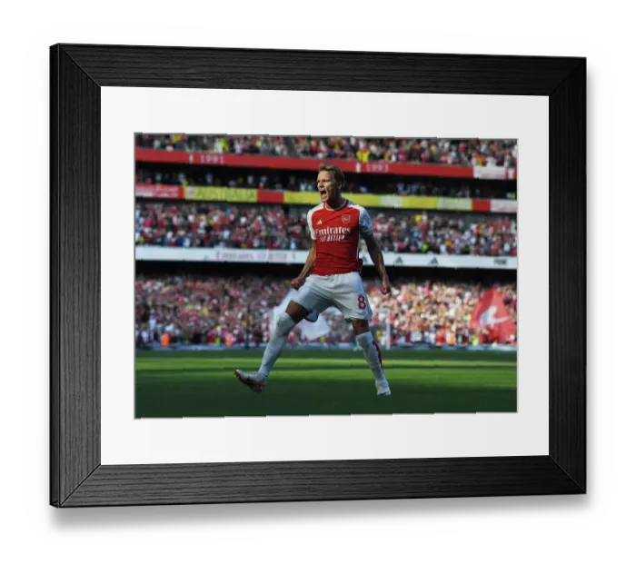 Framed Print : Martin Odegaard Scores First Goal: Arsenal vs Manchester United, Premier League 2023-24 Framed Print : Martin Odegaard Scores First Goal: Arsenal vs Manchester United, Premier League 2023-24