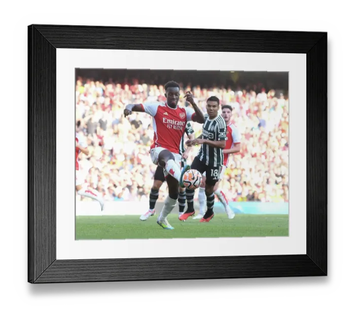 Framed Print : Arsenal's Eddie Nketiah Goes Head-to-Head with Manchester United in the 2023-24 Premier League Showdown Framed Print : Arsenal's Eddie Nketiah Goes Head-to-Head with Manchester United in the 2023-24 Premier League Showdown