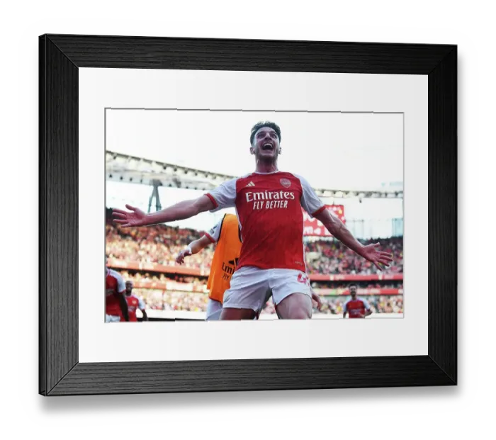 Framed Print : Arsenal Celebrate as Declan Rice Scores Second Goal Against Manchester United (2023-24)