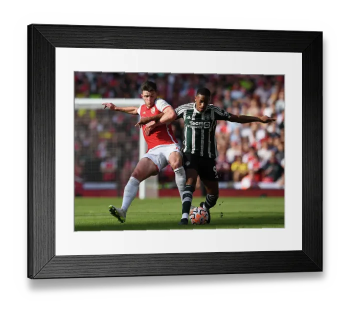 Framed Print : Battle for Possession: Arsenal vs Manchester United - Premier League 2023-24