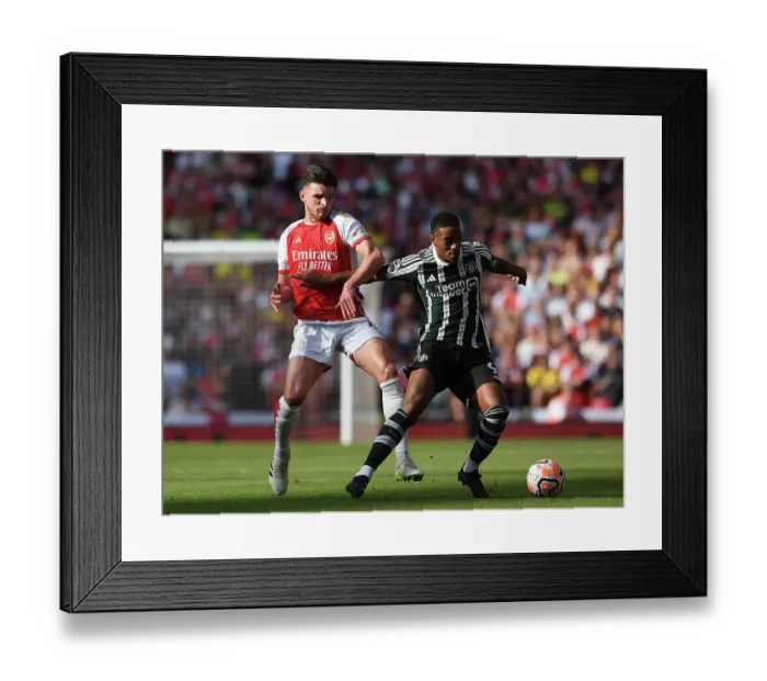 Framed Print : Battle for Possession: Arsenal vs Manchester United - 2023-24 Premier League