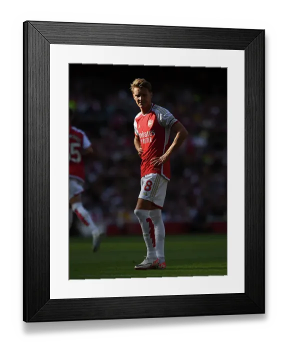Framed Print : Martin Odegaard Shines: Arsenal Triumphs over Manchester United in the 2023-24 Premier League Showdown