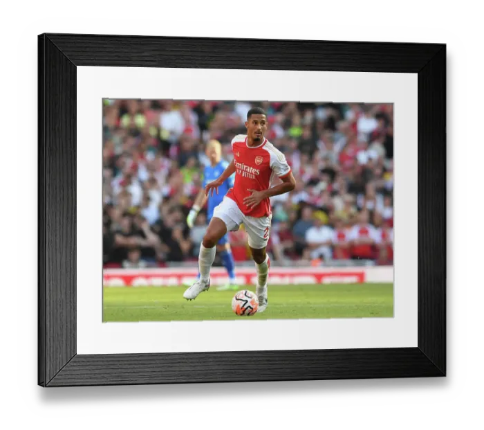 Framed Print : Arsenal's William Saliba Chases Victory: Arsenal FC vs Manchester United, 2023-24 Premier League