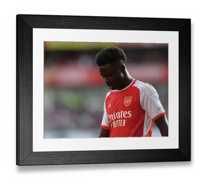 Framed Print : Arsenal's Bukayo Saka Faces Manchester United in the 2023-24 Premier League Showdown