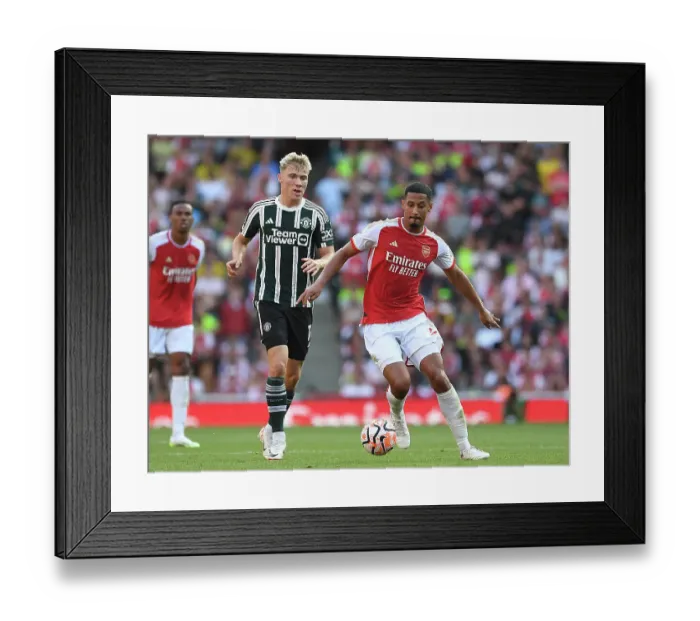 Framed Print : Arsenal vs Manchester United: William Saliba Holds Off Rasmus Hojlund in Intense 2023-24 Premier League Clash Framed Print : Arsenal vs Manchester United: William Saliba Holds Off Rasmus Hojlund in Intense 2023-24 Premier League Clash