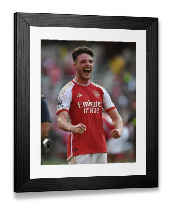 Framed Print : Arsenal's Thrilling Victory Over Manchester United: Declan Rice's Emotional Celebration (2023-24 Premier League)