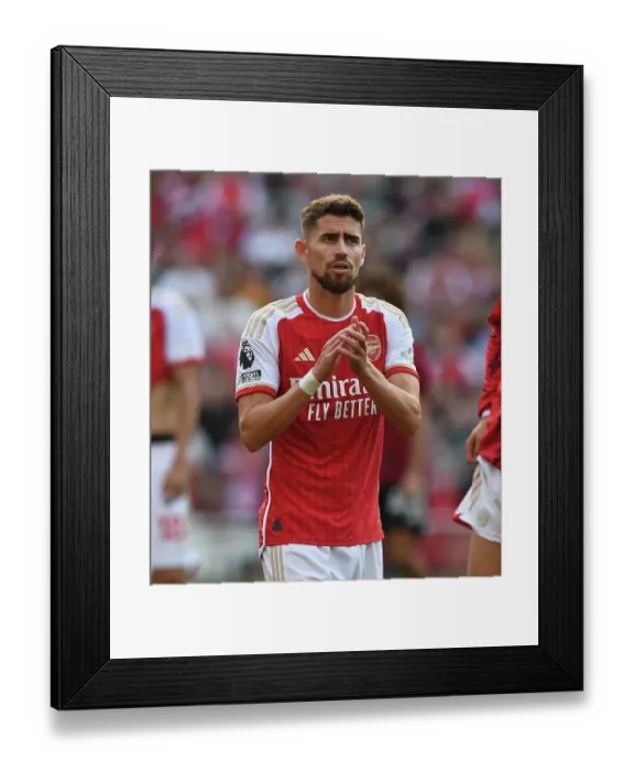 Framed Print : Arsenal's Jorginho Celebrates with Fans after Arsenal vs Manchester United, Premier League 2023-24