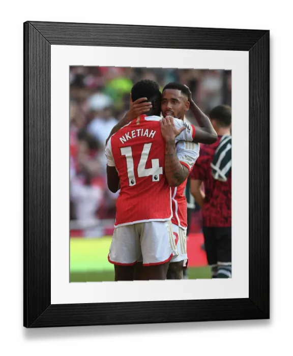 Framed Print : Arsenal's Nketiah and Jesus Celebrate Victory Over Manchester United in 2023-24 Premier League Framed Print : Arsenal's Nketiah and Jesus Celebrate Victory Over Manchester United in 2023-24 Premier League