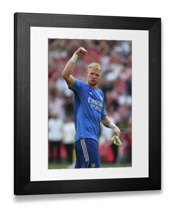 Framed Print : Arsenal's Triumphant Victory Over Manchester United: Aaron Ramsdale's Emotional Celebration (2023-24 Premier League)