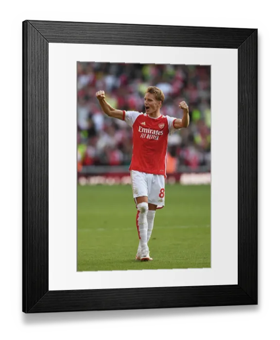 Framed Print : Arsenal Triumphs Over Manchester United in the 2023-24 Premier League: Martin Ødegaard's Celebration Framed Print : Arsenal Triumphs Over Manchester United in the 2023-24 Premier League: Martin Ødegaard's Celebration