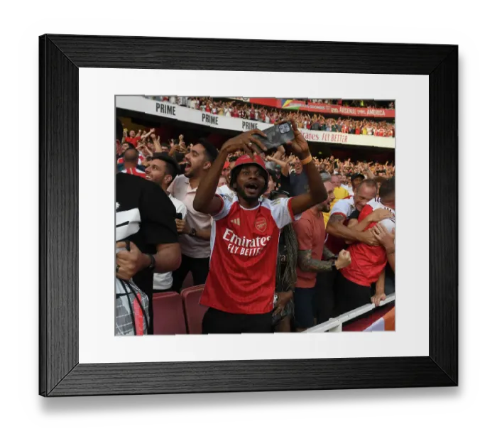 Framed Print : Arsenal Fans Go Wild: Celebrating the Second Goal Against Manchester United (2023-24)