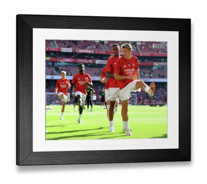 Framed Print : Arsenal vs Manchester United: 2023-24 Premier League Showdown - Martin Odegaard's Emirates Debut