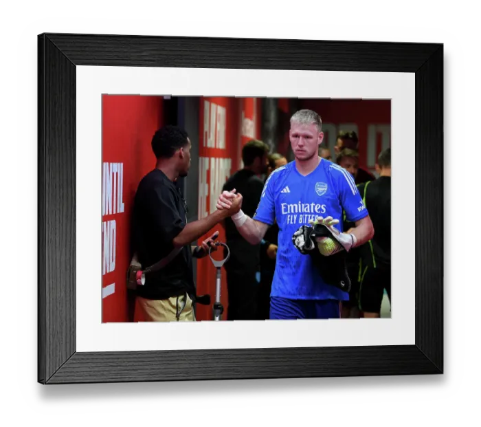 Framed Print : Arsenal's Ramsdale and Timber Share a Moment Before Arsenal v Manchester United (2023-24) Framed Print : Arsenal's Ramsdale and Timber Share a Moment Before Arsenal v Manchester United (2023-24)