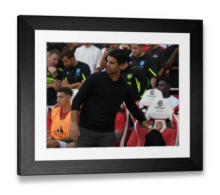 Framed Print : Mikel Arteta's Premier League Showdown: Arsenal vs Manchester United (2023-24) - Arsenal Manager's Determined Face at Emirates Stadium