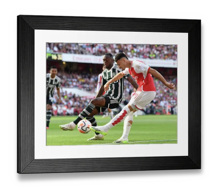 Framed Print : Arsenal's Martinelli Fires Against Manchester United in 2023-24 Premier League Clash Framed Print : Arsenal's Martinelli Fires Against Manchester United in 2023-24 Premier League Clash