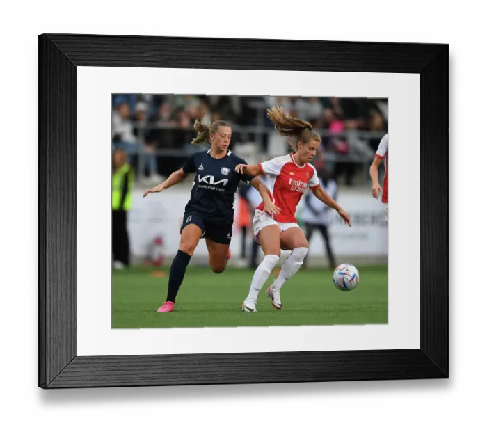 Framed Print : Arsenal's Victoria Pelova Stands Firm Against Linkopings FC Opponent in UEFA Champions League Battle