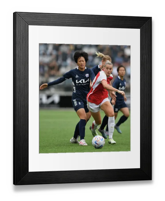 Framed Print : Alessia Russo vs. Soari Takarada: Battle of the Stars in Arsenal's UEFA Champions League Clash