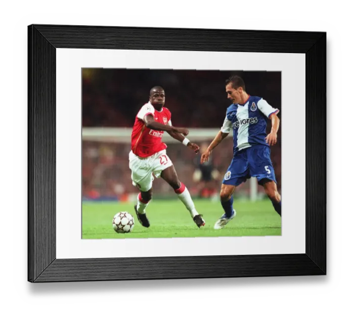 Framed Print : Emmanuel Eboue (Arsenal) Ricardo Costa (Porto) Framed Print : Emmanuel Eboue (Arsenal) Ricardo Costa (Porto)
