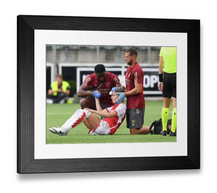 Framed Print : Arsenal Women's UEFA Champions League: Steph Catley Receives Medical Attention vs Paris FC, Sweden (2023-24)