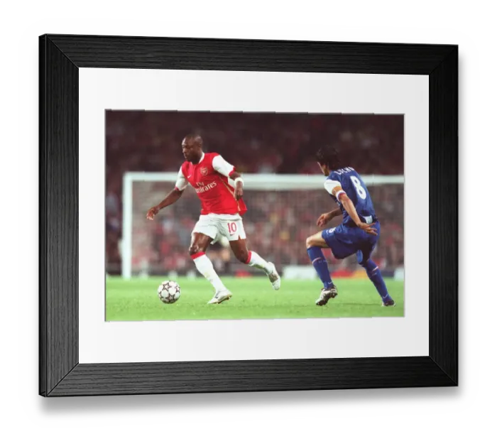 Framed Print : Arsenal's Gallas and Gonzalez Clash in Champions League Showdown: Arsenal 2-0 FC Porto Framed Print : Arsenal's Gallas and Gonzalez Clash in Champions League Showdown: Arsenal 2-0 FC Porto