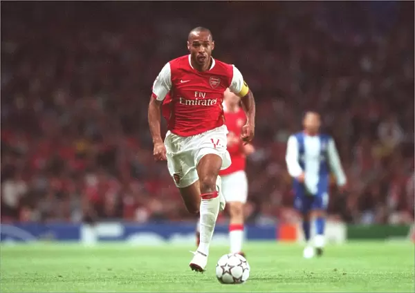 Thierry Henry's Brilliant Double: Arsenal's 2-0 Victory over FC Porto in the UEFA Champions League (September 26, 2006)