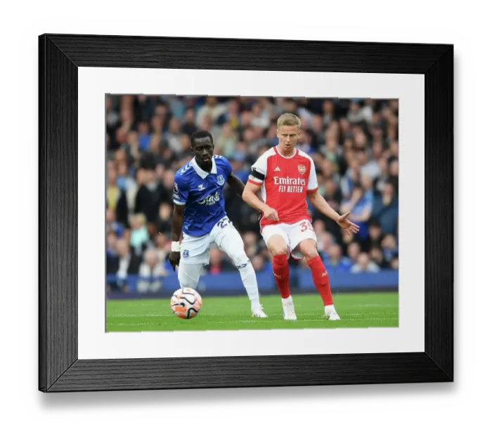 Framed Print : Arsenal's Zinchenko Faces Pressure from Everton's Gueye in Premier League Clash