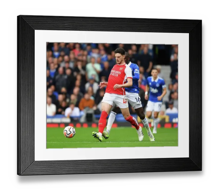 Framed Print : Arsenal's Declan Rice Fights Past Everton's Abdoulaye Doucoure in Premier League Clash (Everton vs Arsenal 2023-24) Framed Print : Arsenal's Declan Rice Fights Past Everton's Abdoulaye Doucoure in Premier League Clash (Everton vs Arsenal 2023-24)