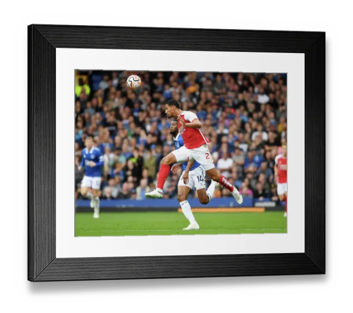 Framed Print : William Saliba vs. Beto: Heading Battle at Goodison Park - Everton vs. Arsenal, 2023-24 Premier League