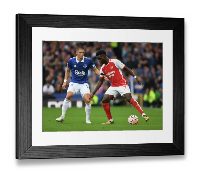 Framed Print : Saka vs Mykolenko: A Premier League Battle at Goodison Park - Arsenal vs Everton, 2023-24