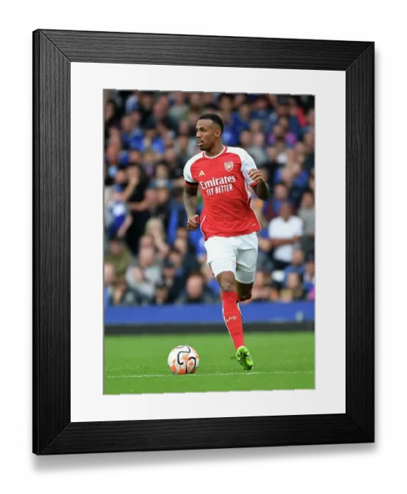 Framed Print : Gabriel Charges Forward: Everton vs. Arsenal, Premier League 2023-24 Framed Print : Gabriel Charges Forward: Everton vs. Arsenal, Premier League 2023-24