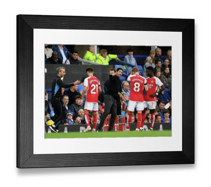 Framed Print : Arsenal Boss Mikel Arteta Conferring with Saka and Odegaard during Everton Clash (2023-24) Framed Print : Arsenal Boss Mikel Arteta Conferring with Saka and Odegaard during Everton Clash (2023-24)