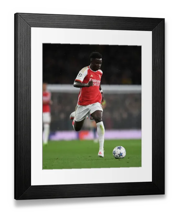 Framed Print : Bukayo Saka's Standout Display: Arsenal's Victory Over PSV Eindhoven in the Champions League