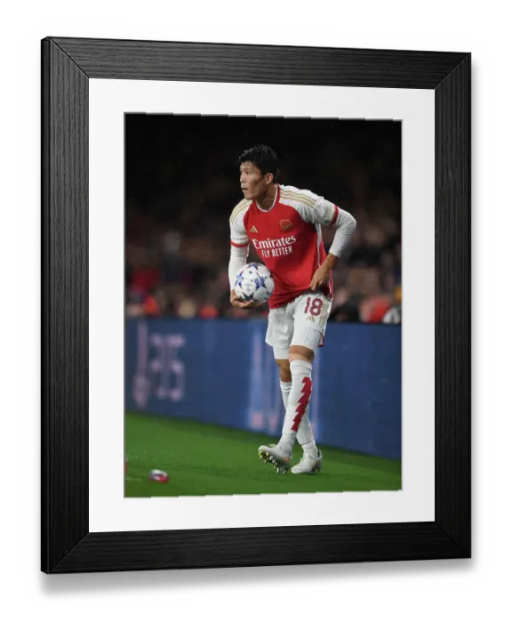 Framed Print : Champions League: Tomiyasu's Brilliant Debut - Arsenal Triumphs Over PSV Eindhoven Framed Print : Champions League: Tomiyasu's Brilliant Debut - Arsenal Triumphs Over PSV Eindhoven